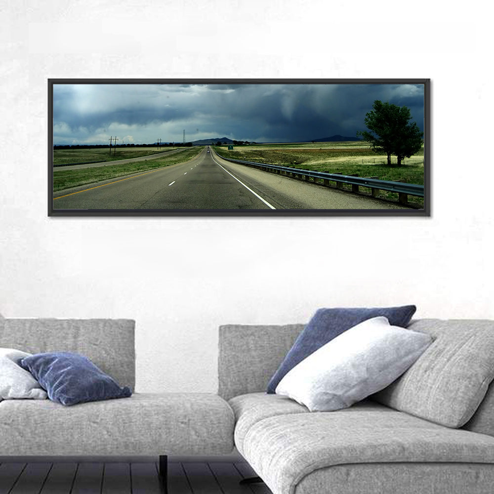 Stormy New Mexico Highway Wall Art in a room, panoramic