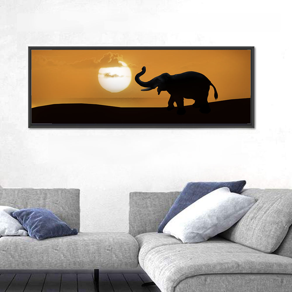Elephant at Sunset Wall Art in a room, panoramic