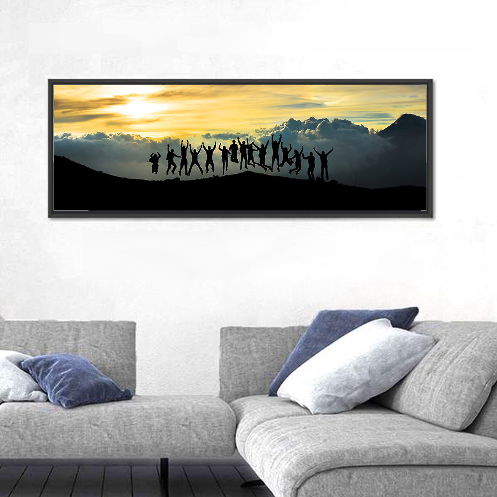 Golden Team Silhouettes at Sunset Wall Art in a room, panoramic