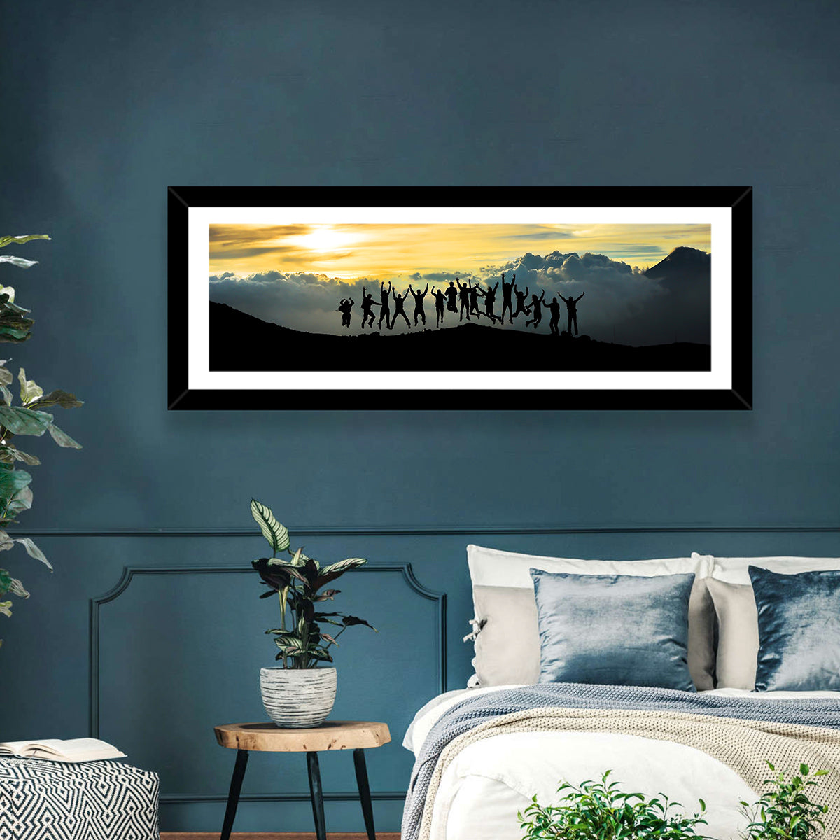 Golden Team Silhouettes at Sunset Wall Art in a room, panoramic