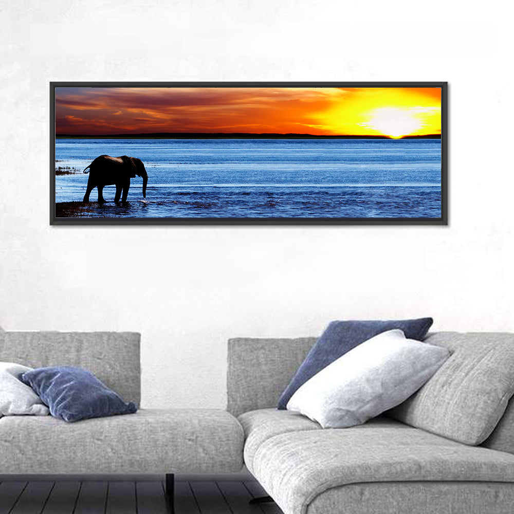 Elephant Silhouette at Beach Sunset Wall Art in a room, panoramic