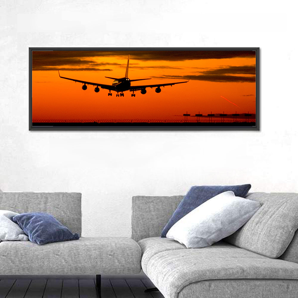Plane Landing at Sunset Wall Art