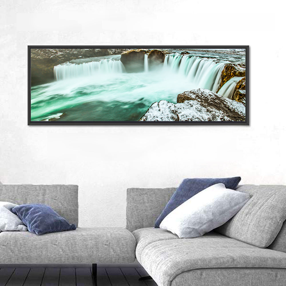 Goðafoss Winter Waterfall Wall Art in a room, panoramic