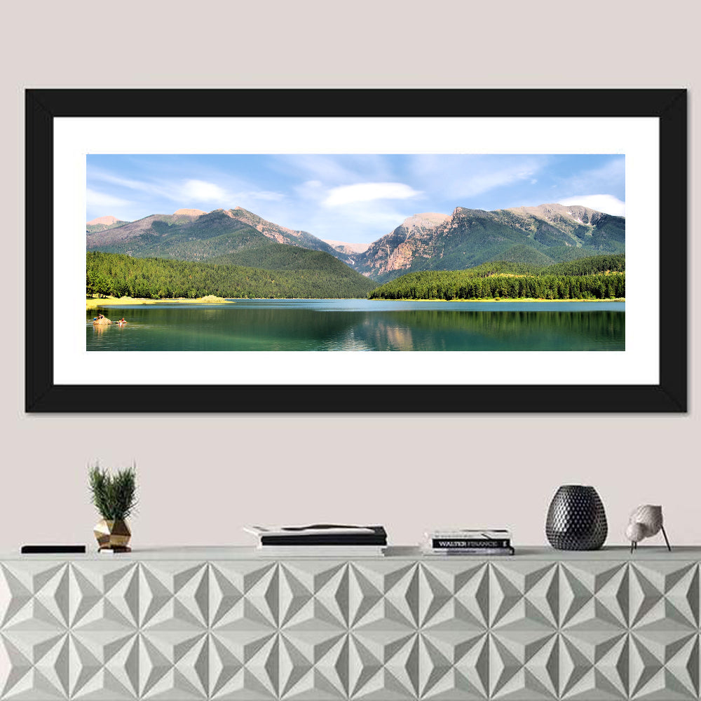 Mission Mountain Lake Reflection Wall Art in a room, panoramic