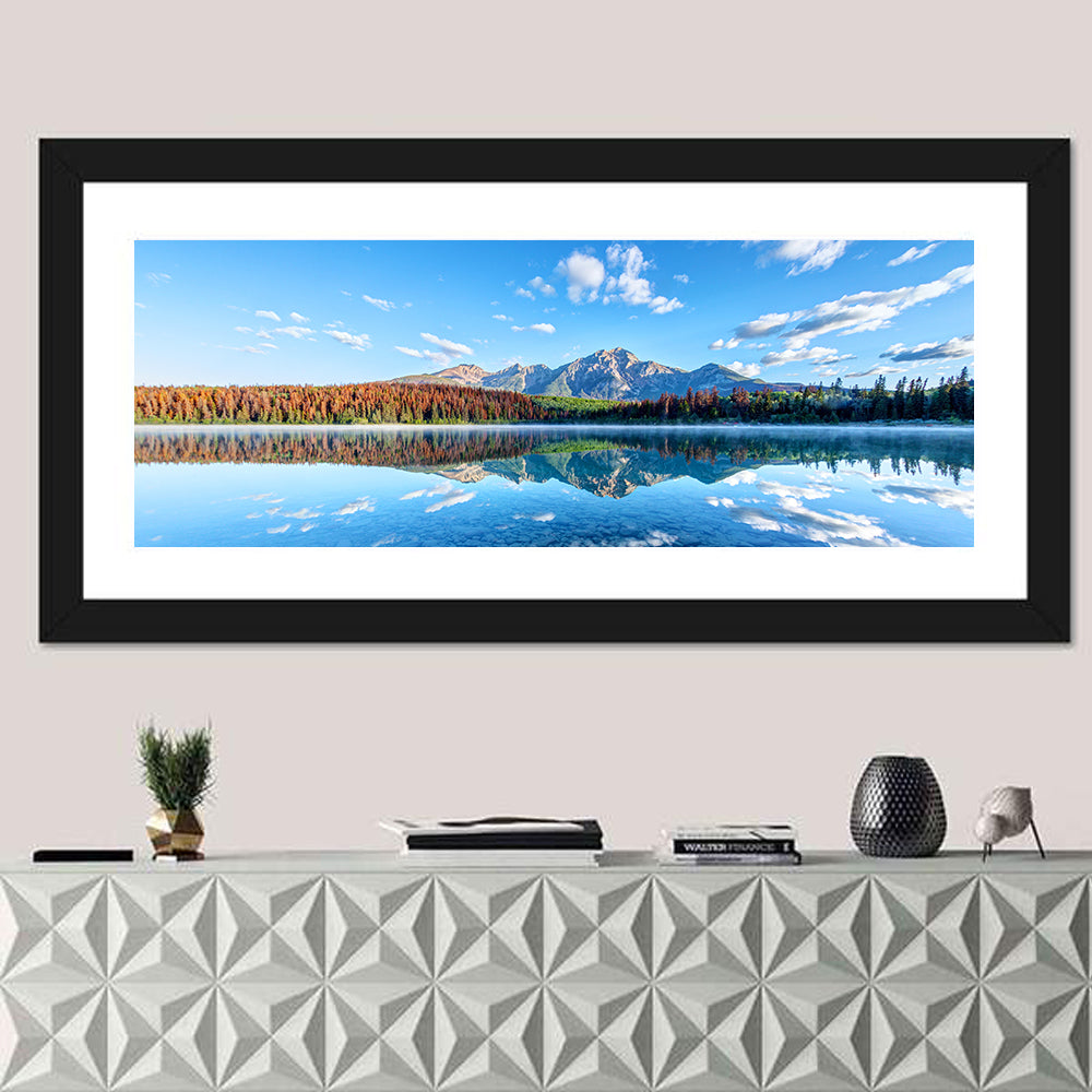Patricia Lake Autumn Reflection Wall Art in a room, panoramic