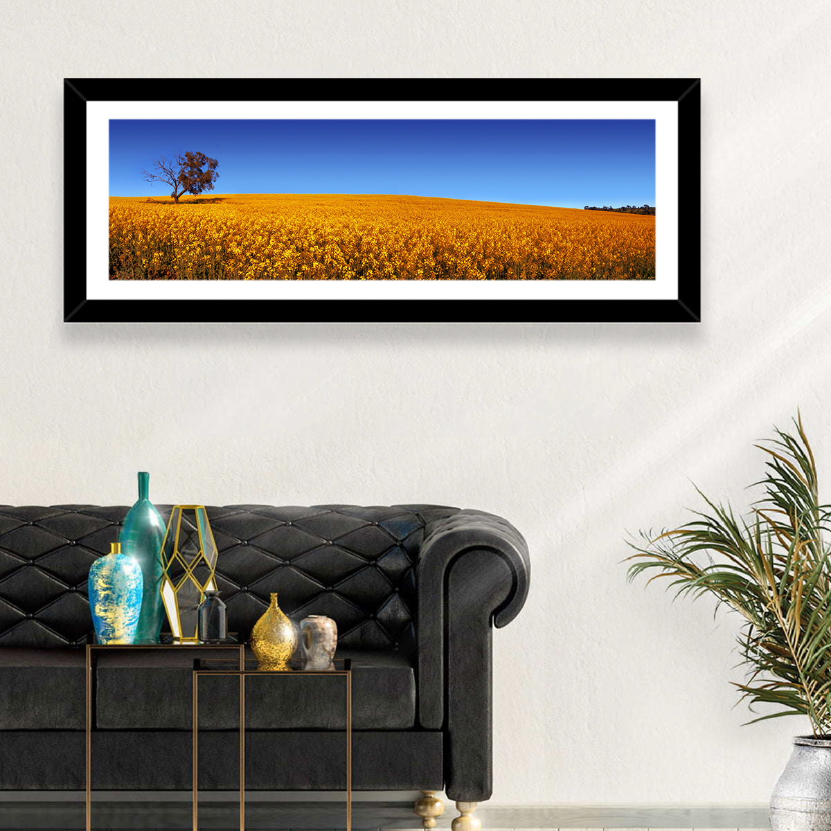 Canola Field with Lone Tree Wall Art in a room, panoramic