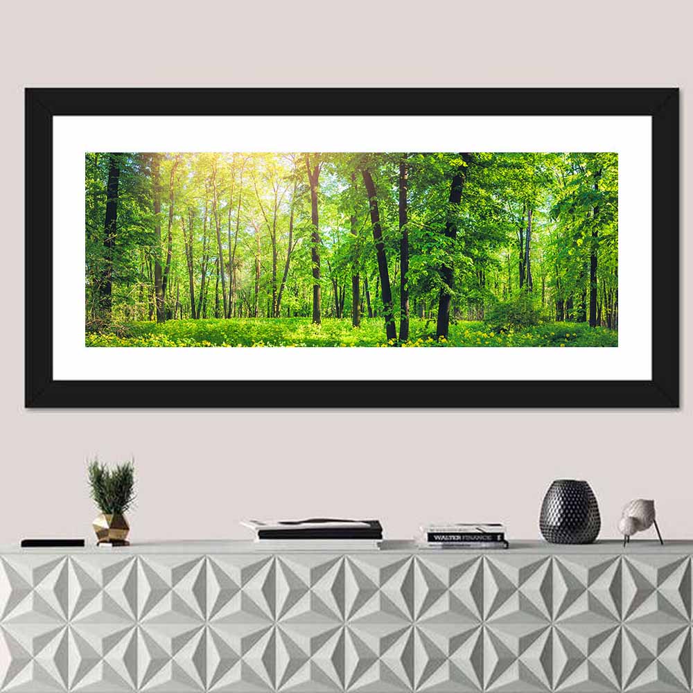 Sunlit Green Forest with Yellow Wildflowers Wall Art