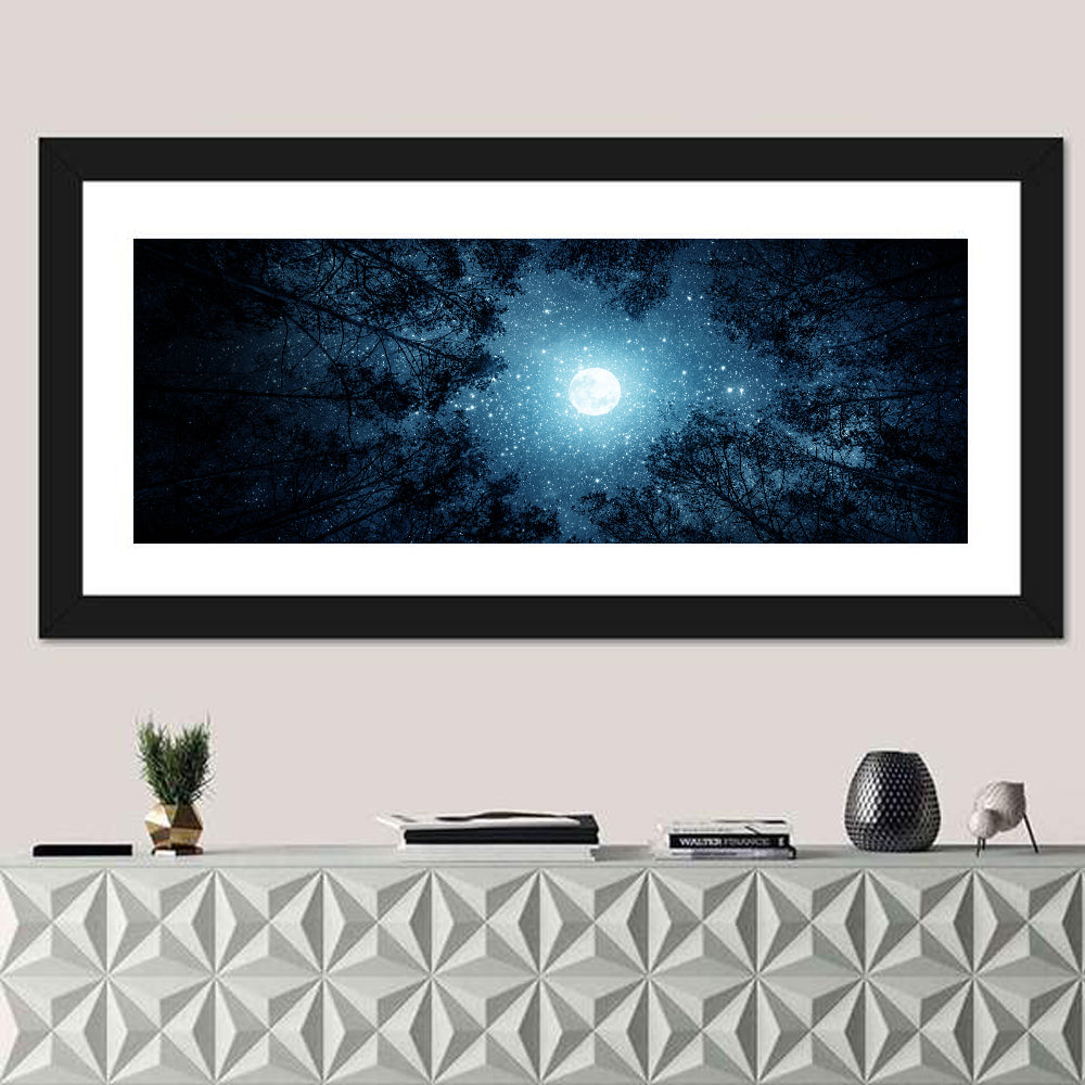 Full Moon Over Forest Wall Art in a room, panoramic