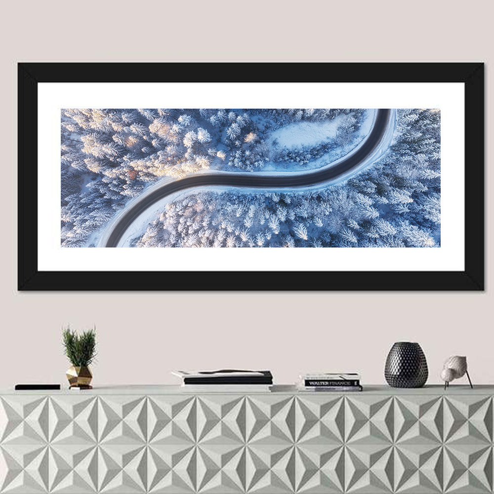 Winding Snow-covered Forest Road Wall Art in a room, panoramic