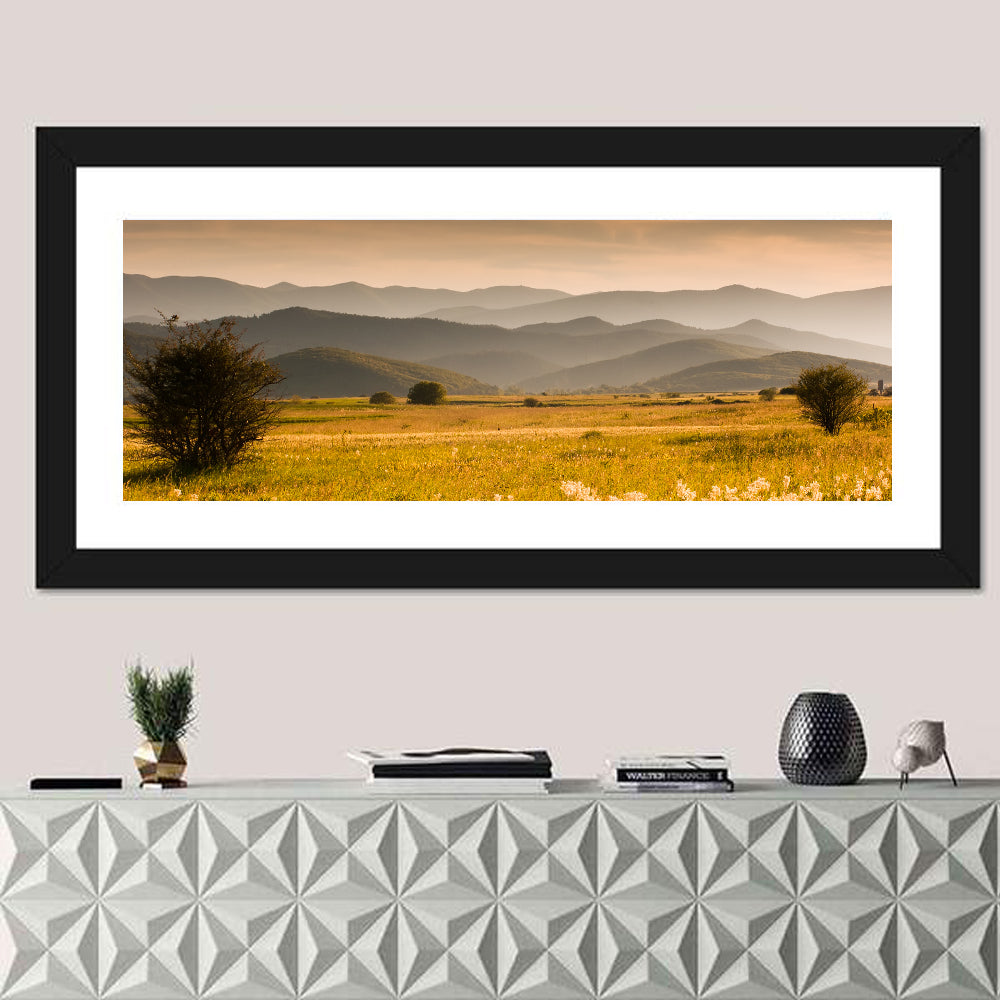 Golden Hour Countryside Hills Wall Art in a room, panoramic