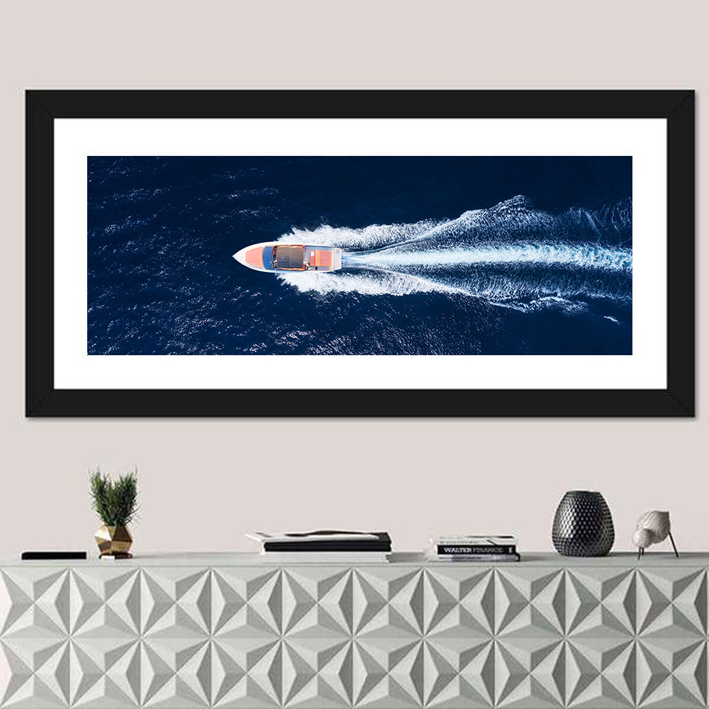 Sleek Speedboat Over Navy Sea Wall Art in a room, panoramic