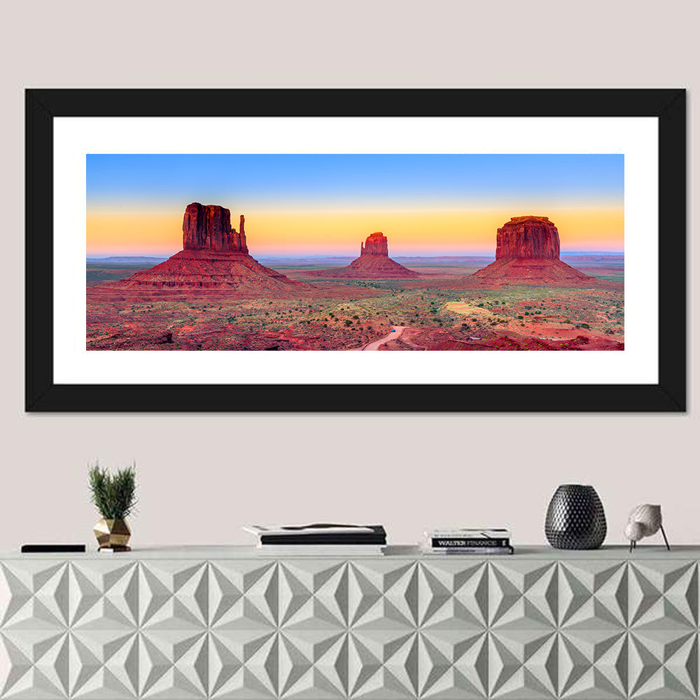 Monument Valley Sunset Vista Wall Art in a room, panoramic