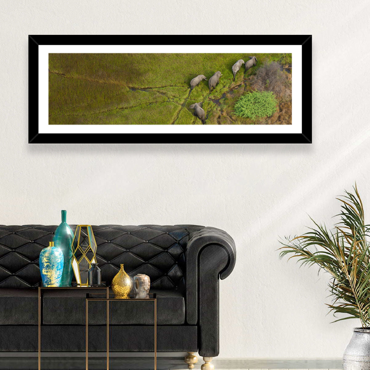 Aerial Herd of Elephants Wall Art in a room, panoramic