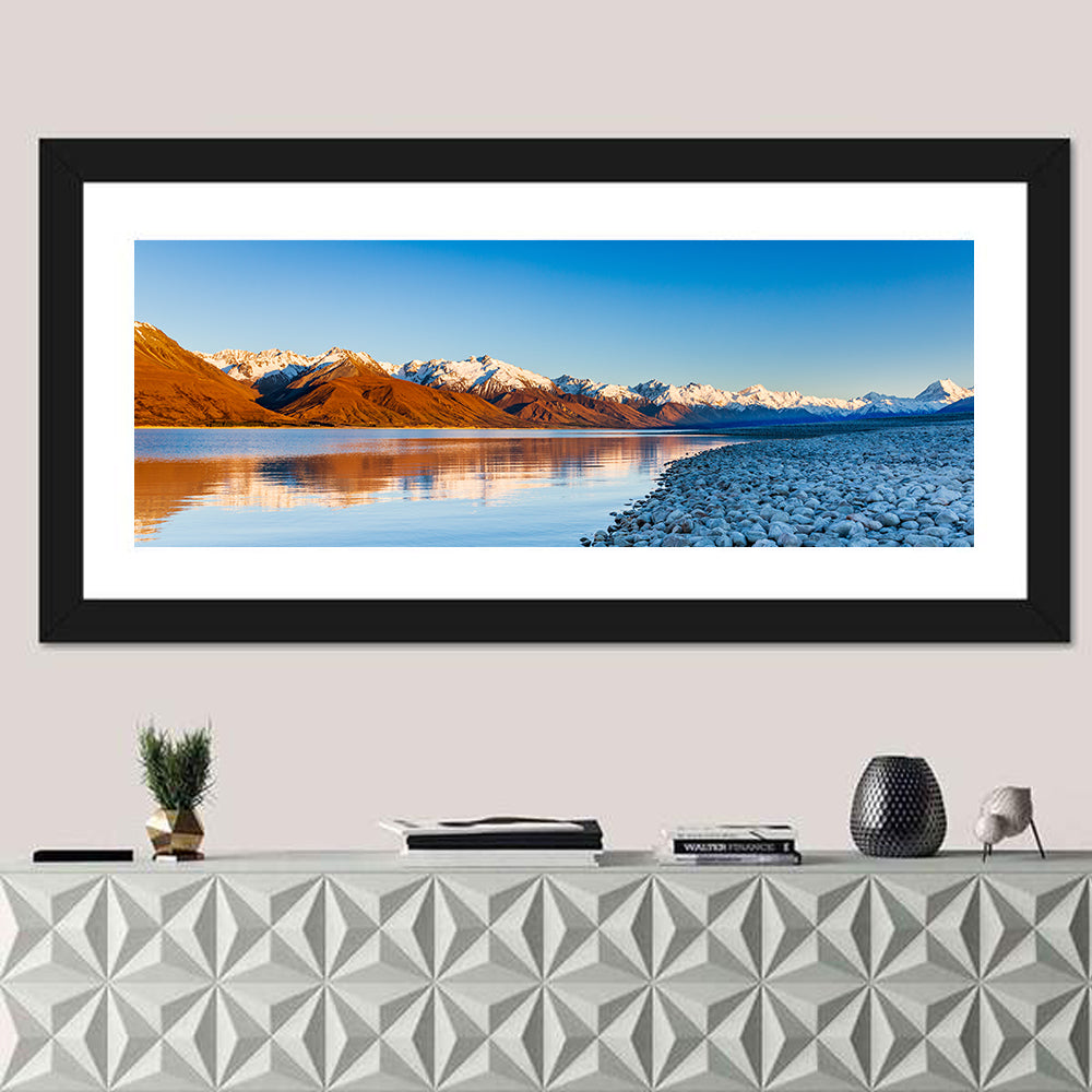 Lake Pukaki Sunset Reflection Wall Art in a room, panoramic