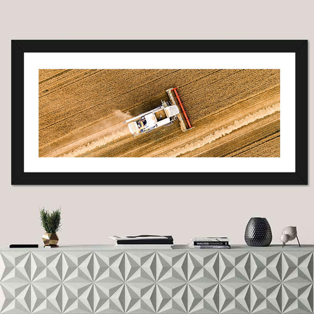 Aerial Combine Over Wheat Field Wall Art in a room, panoramic