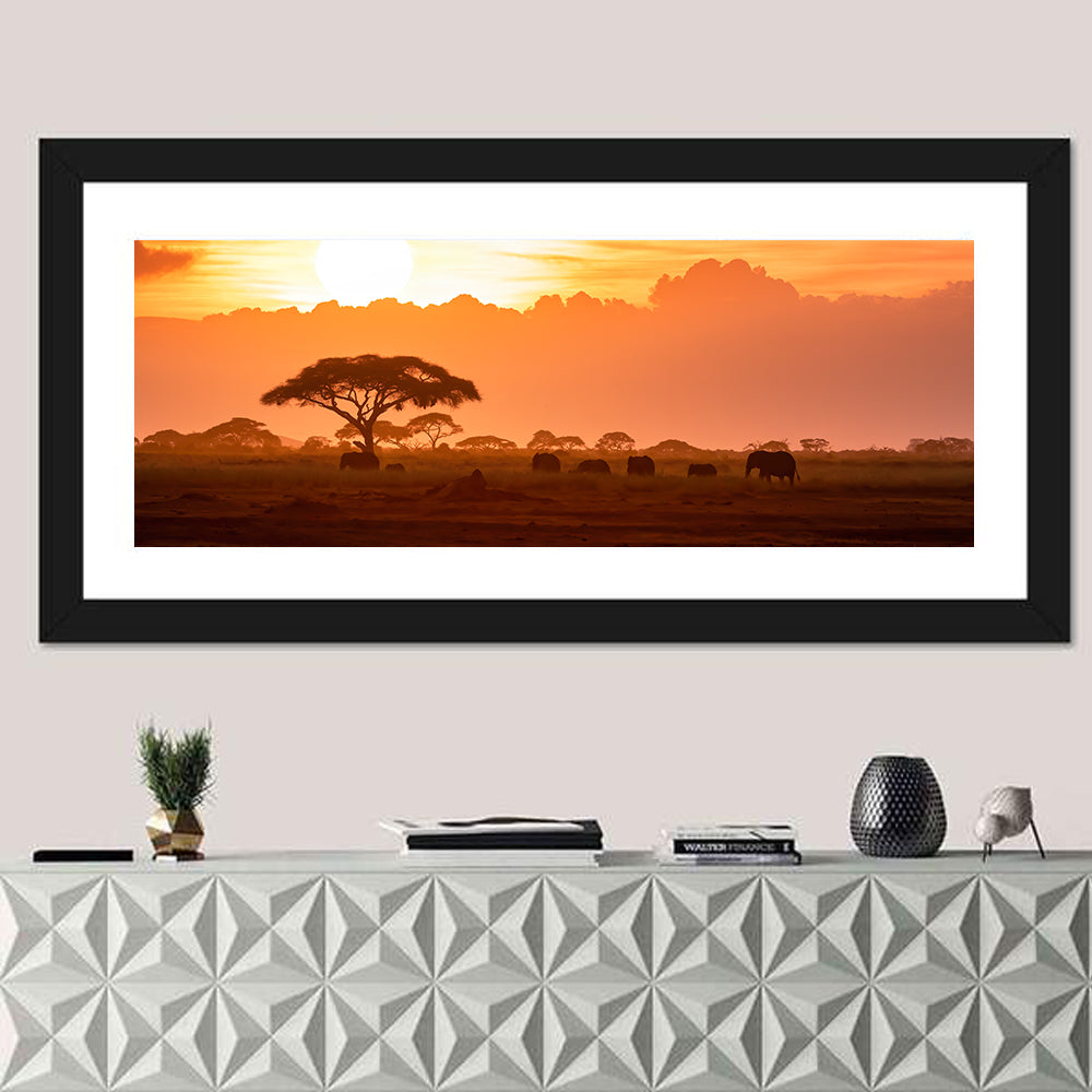 African Elephant Herd at Sunset Wall Art in a room, panoramic
