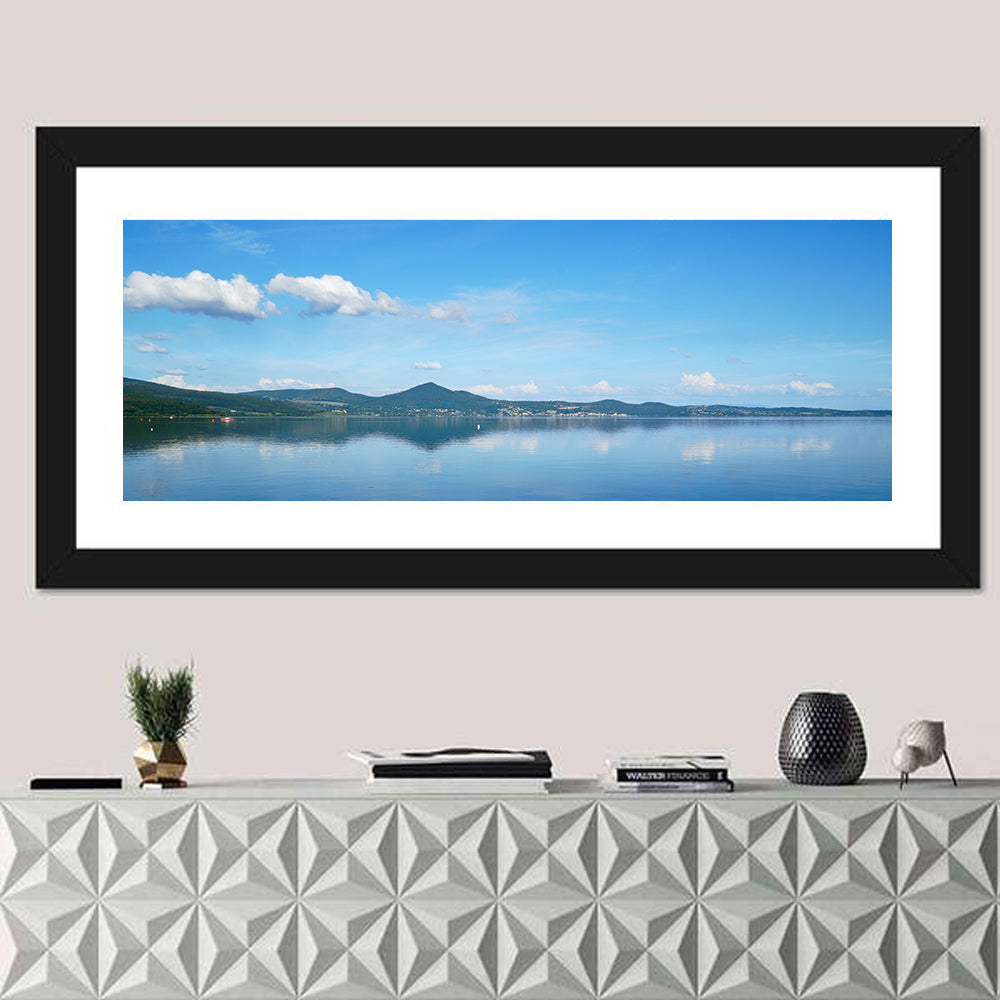 Lake Bracciano Reflection Wall Art in a room, panoramic