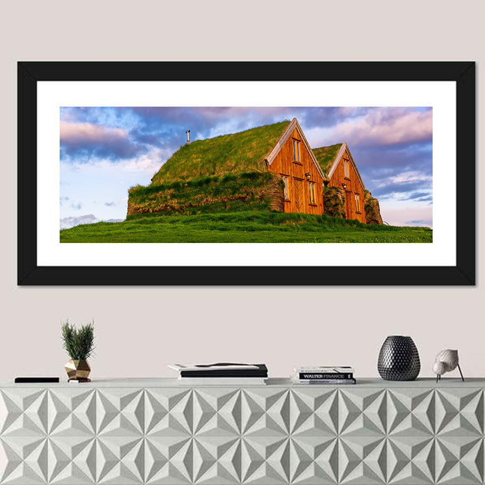 Icelandic Turf Houses at Dusk Wall Art in a room, panoramic