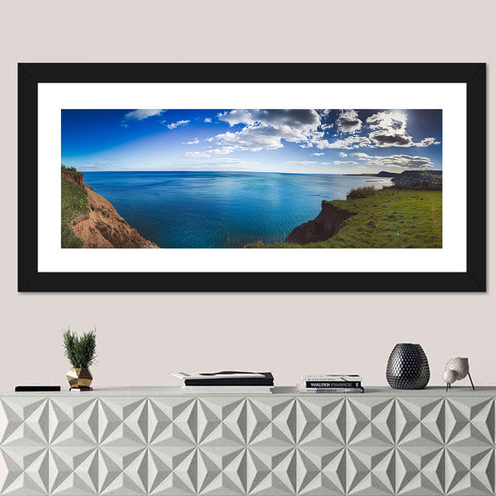 Sidmouth Cliffs and Sea View Wall Art in a room, panoramic