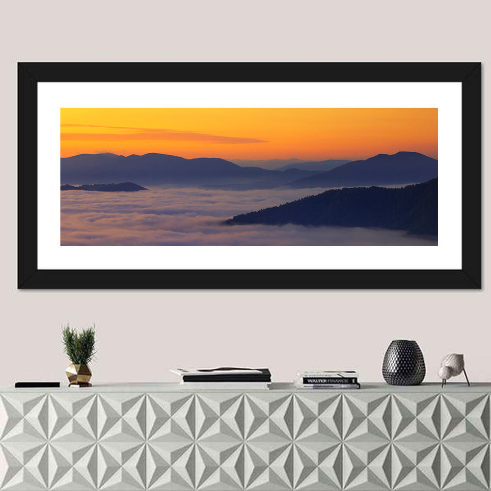 Cloud Sea Over Mountains at Golden Dawn Wall Art in a room, panoramic