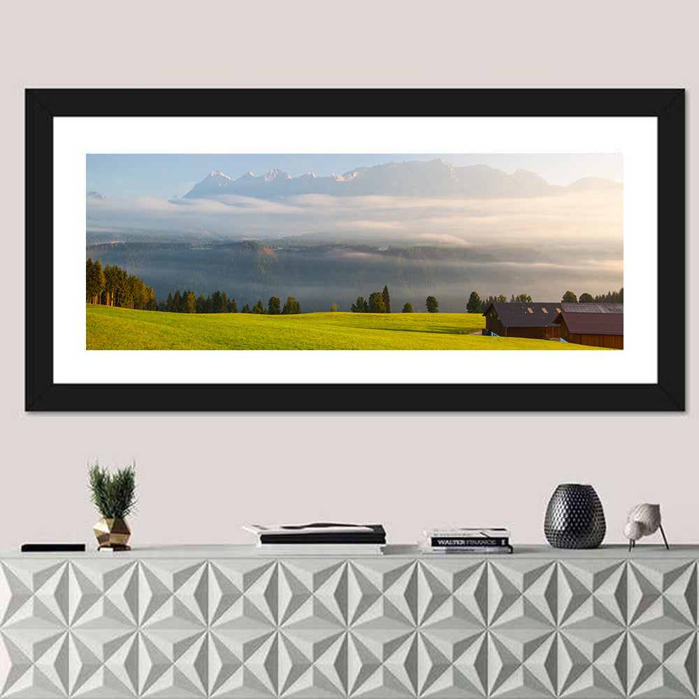 Sunlit Mountain Clouds Wall Art in a room, panoramic