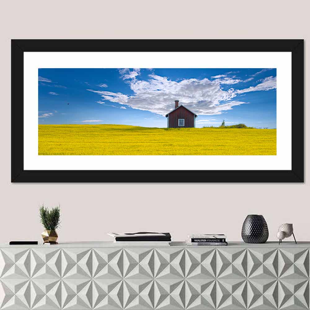 Red Barn in Golden Wheat Field Wall Art in a room, panoramic