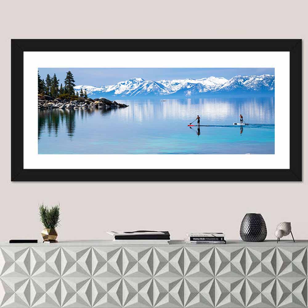 Lake Tahoe Paddleboarders Wall Art in a room, panoramic