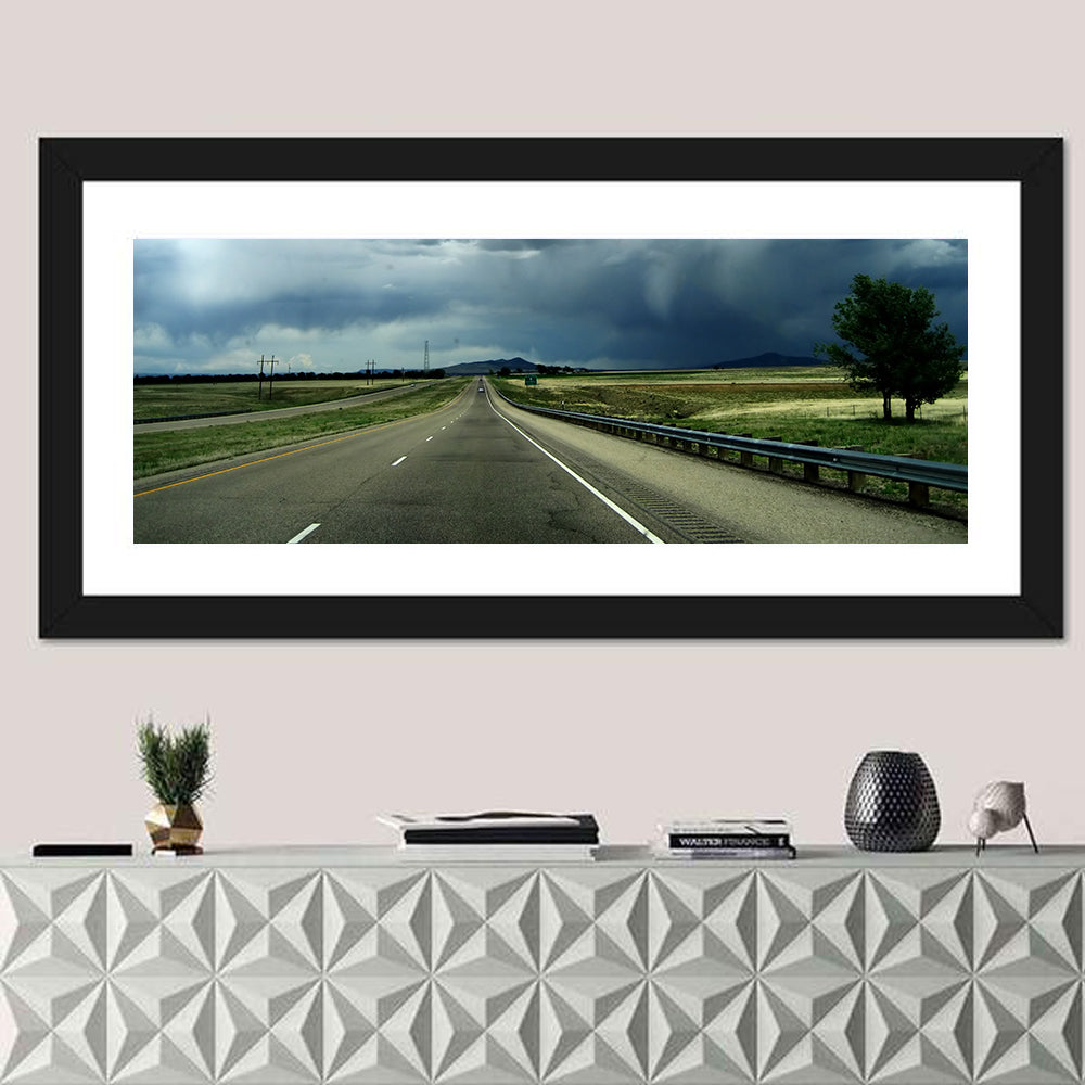 Stormy New Mexico Highway Wall Art in a room, panoramic