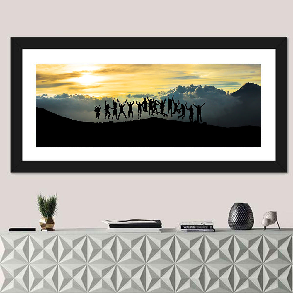 Golden Team Silhouettes at Sunset Wall Art in a room, panoramic
