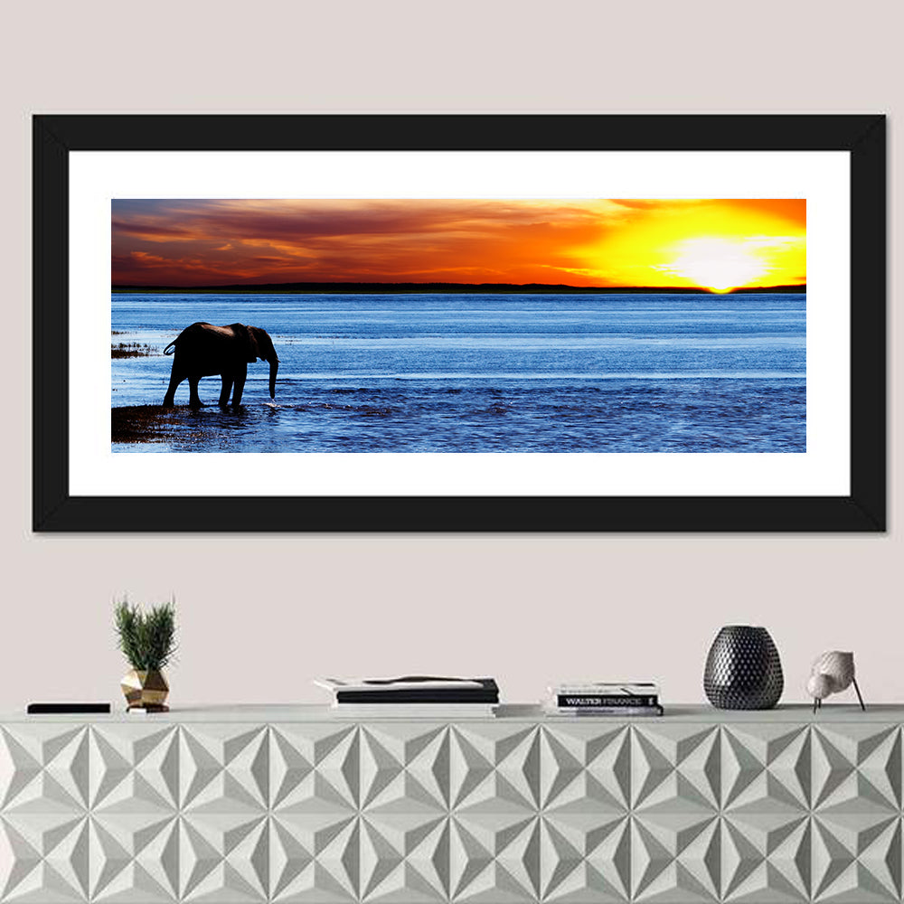 Elephant Silhouette at Beach Sunset Wall Art in a room, panoramic