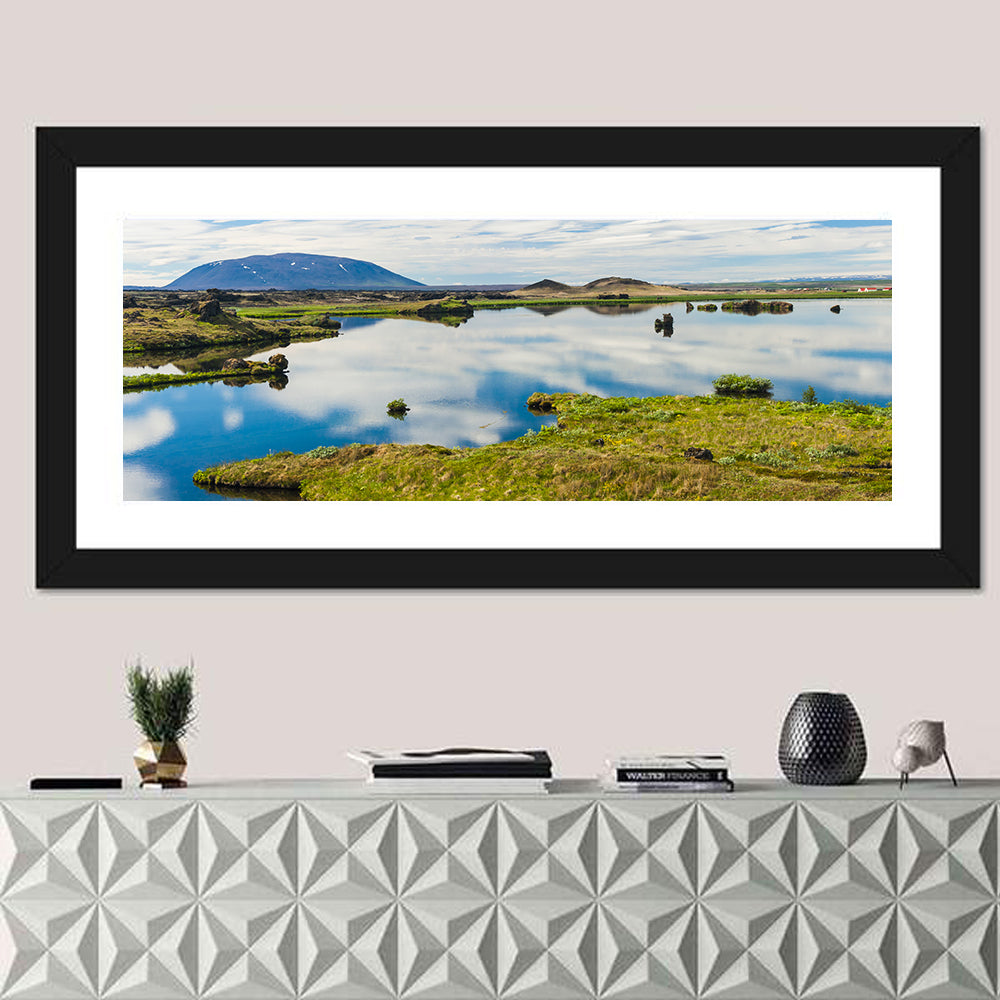 Lake Myvatn Reflection Wall Art in a room, panoramic