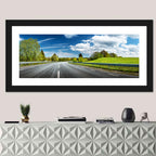 Sunlit Asphalt Road Wall Art