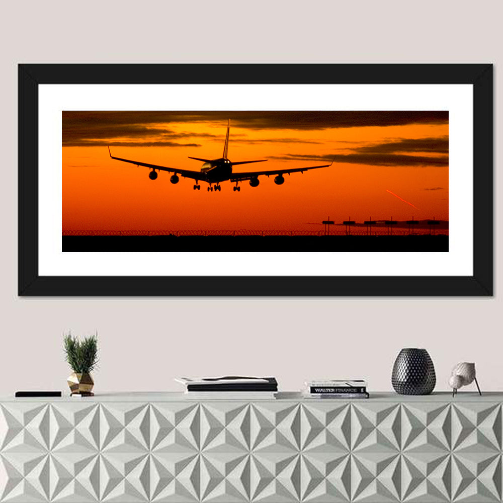 Plane Landing at Sunset Wall Art