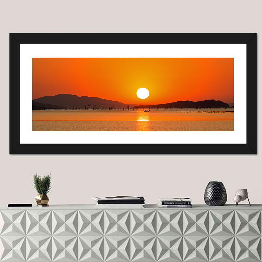 Lake Kariba Sunset Silhouette Wall Art in a room, panoramic