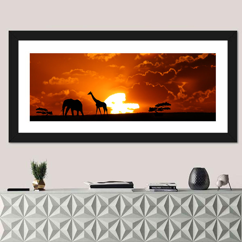 Safari Sunset Silhouettes Wall Art in a room, panoramic