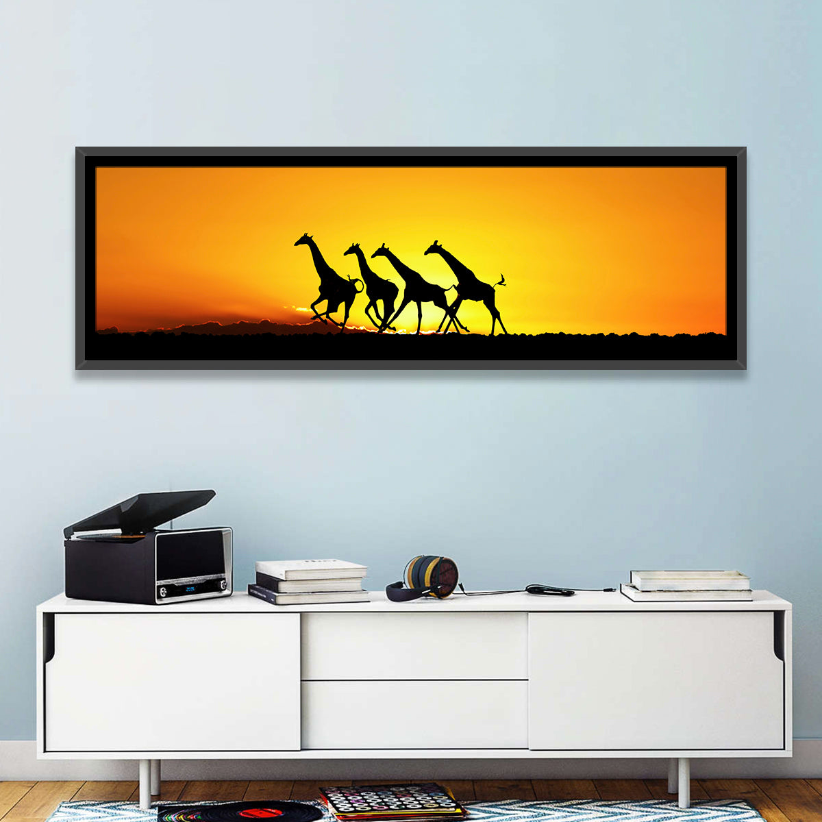 Savanna Giraffes at Sunset Wall Art in a room, panoramic