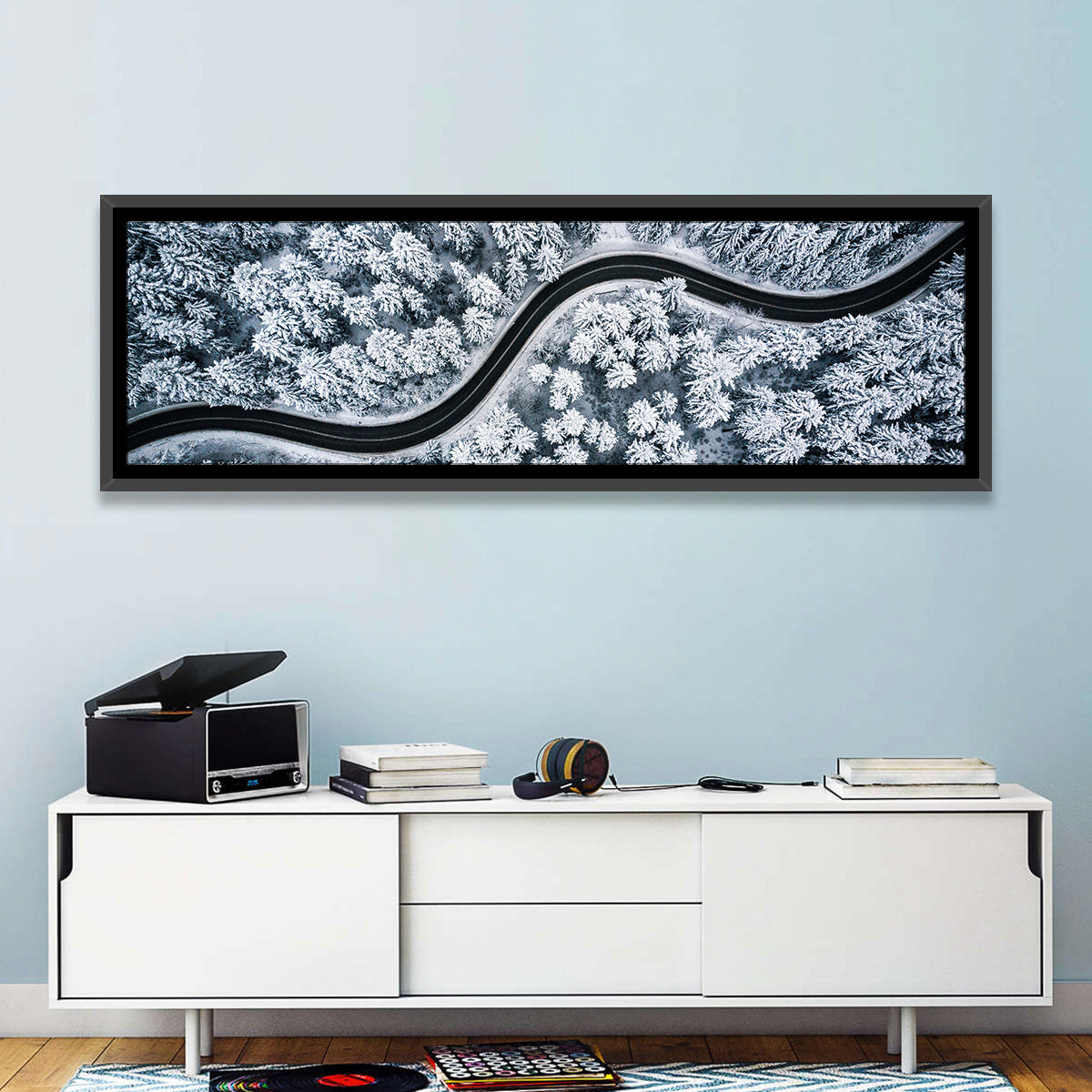 S-curve Winter Forest Road Wall Art in a room, panoramic