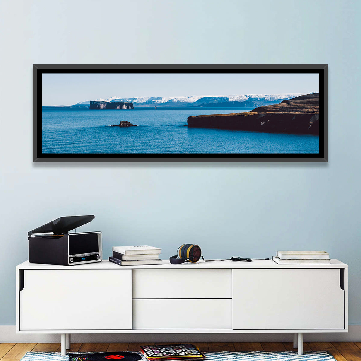 Calm Blue Lake with Coastal Cliffs Wall Art in a room, panoramic