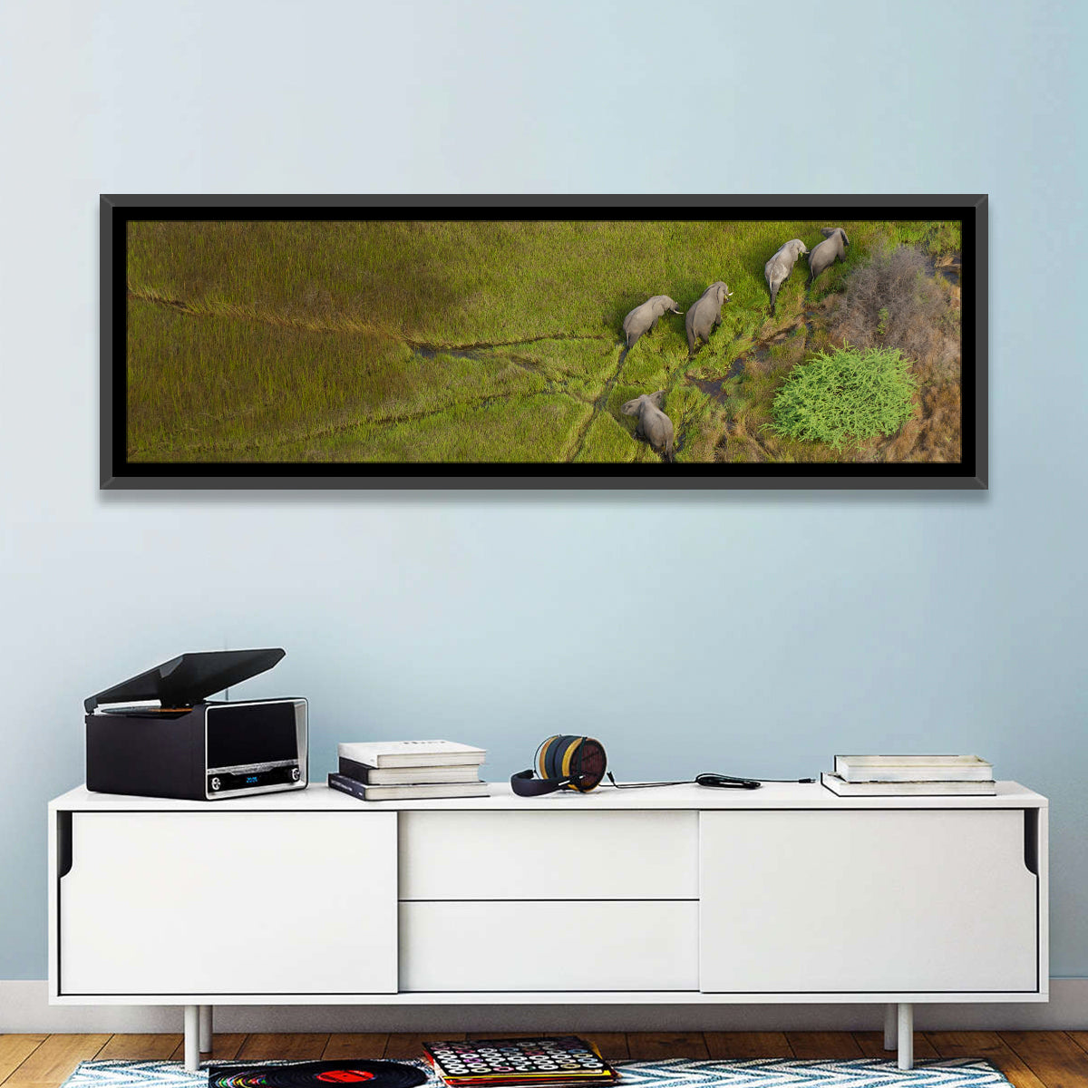 Aerial Herd of Elephants Wall Art in a room, panoramic
