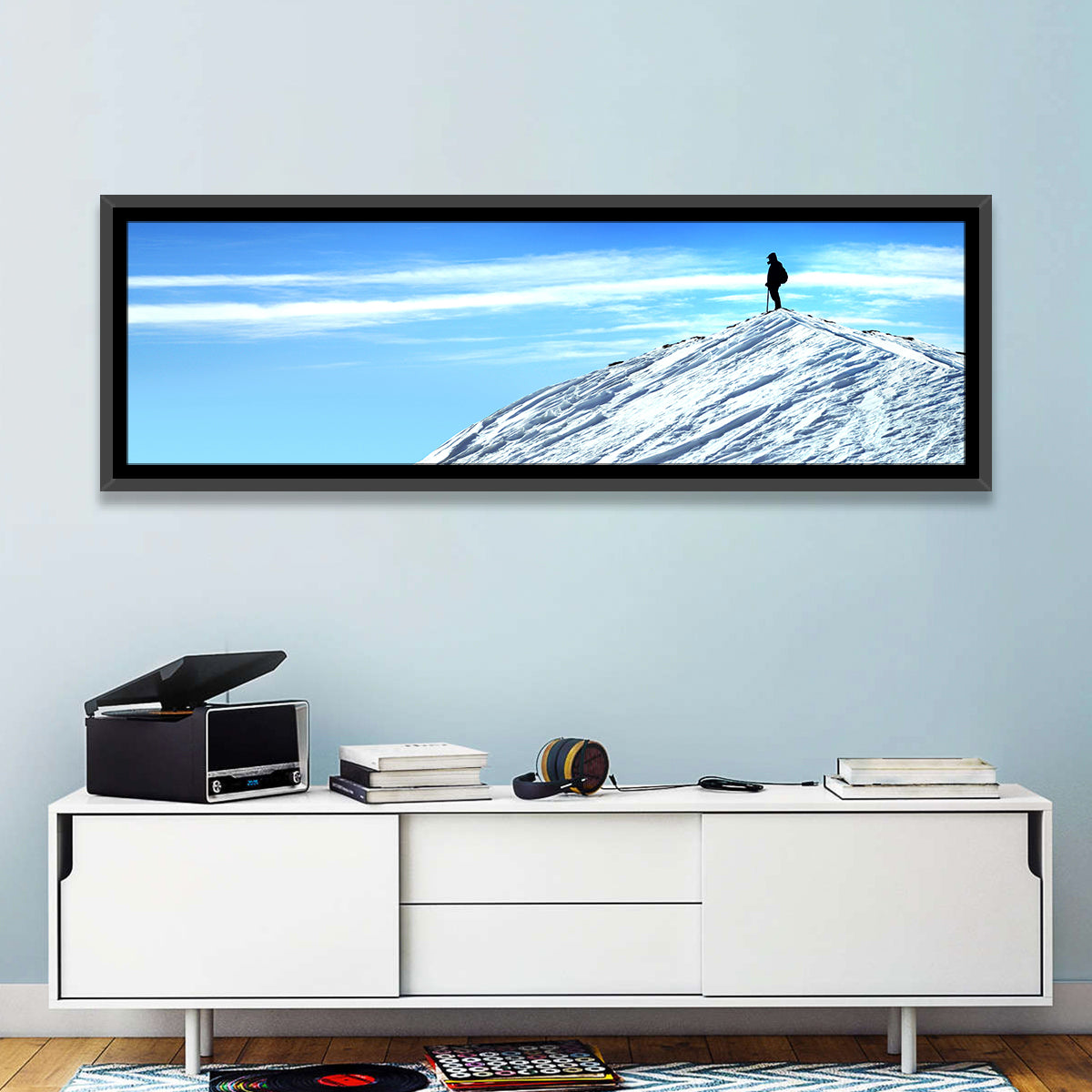 Mountaineer Summit Silhouette Wall Art in a room, panoramic