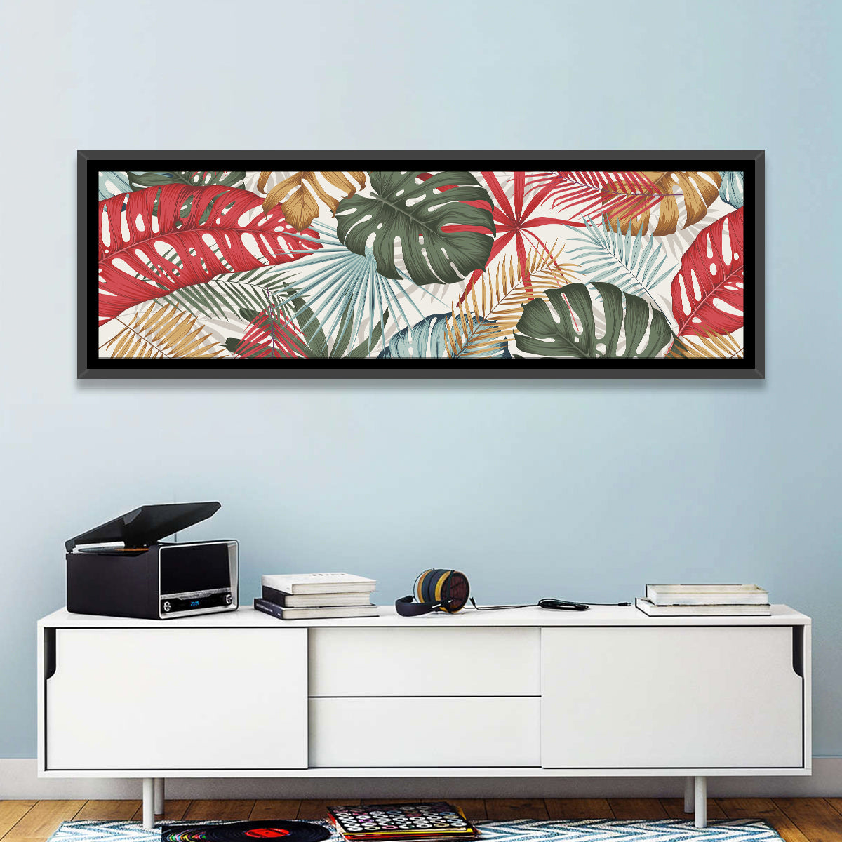 Red and Green Tropical Leaves Pattern Wall Art in a room, panoramic