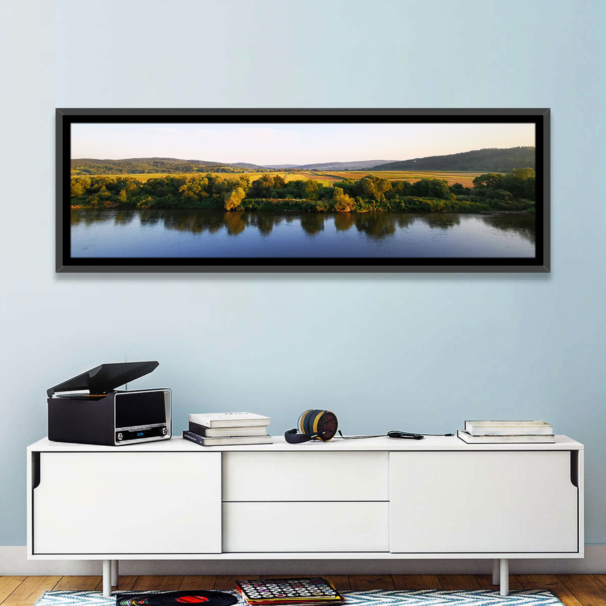 Peaceful River Sunset Wall Art in a room, panoramic