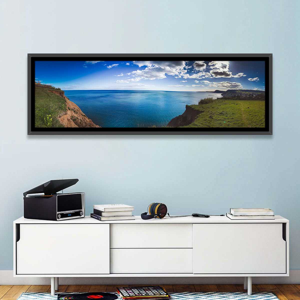 Sidmouth Cliffs and Sea View Wall Art in a room, panoramic