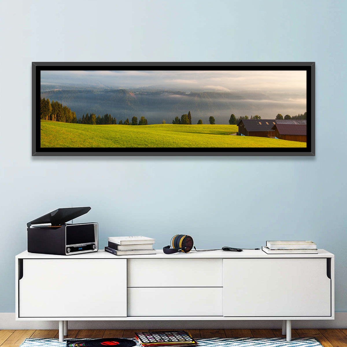 Sunlit Mountain Clouds Wall Art in a room, panoramic