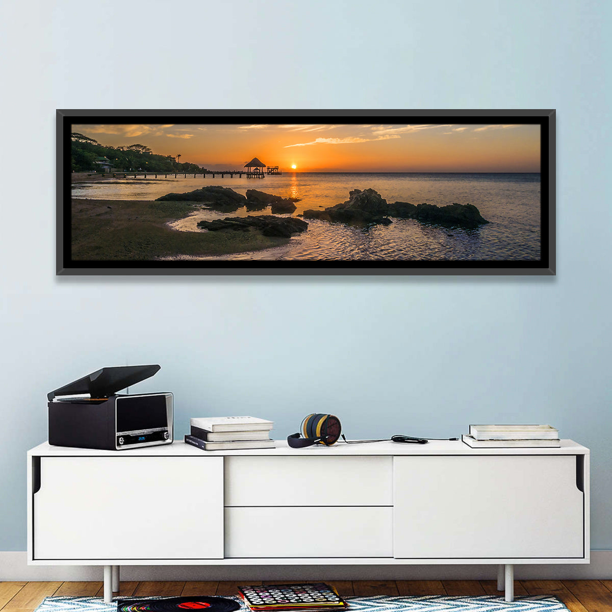 Roatan Pier Sunset Wall Art in a room, panoramic