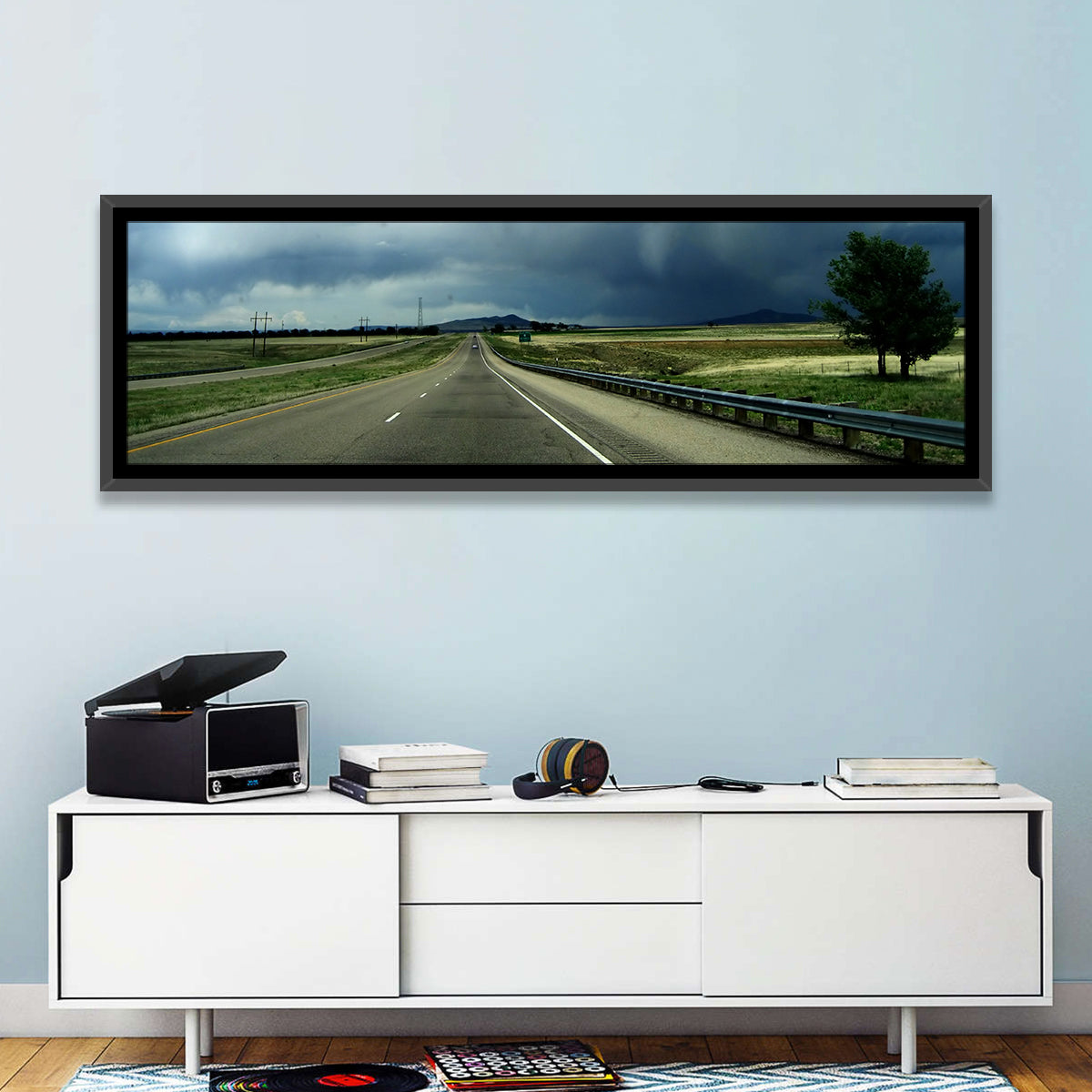 Stormy New Mexico Highway Wall Art in a room, panoramic