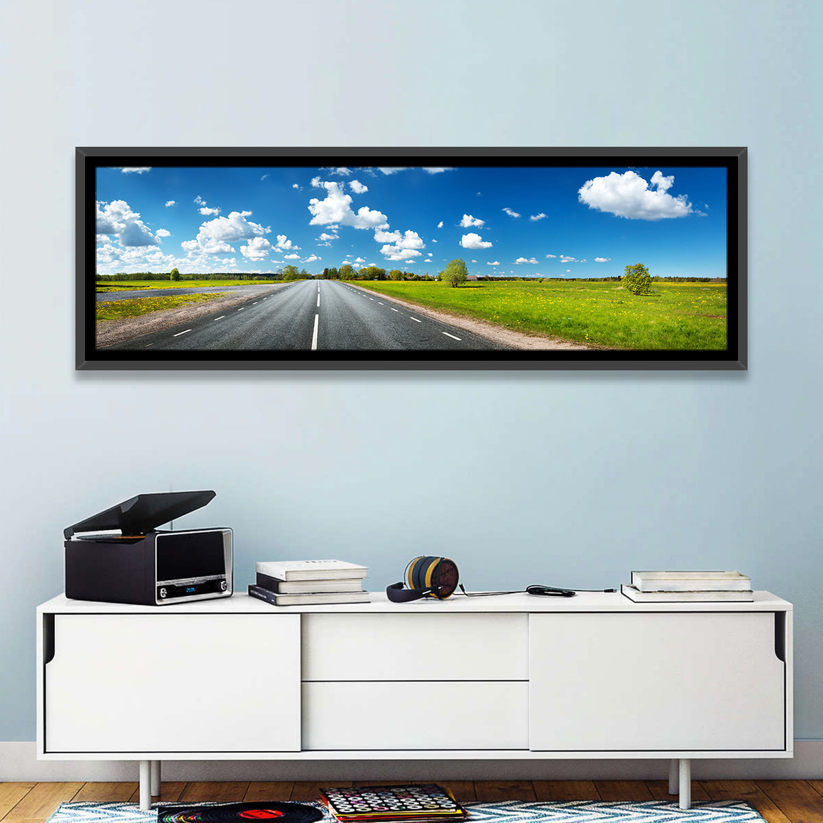 Asphalt Road Through Meadow Wall Art in a room, panoramic