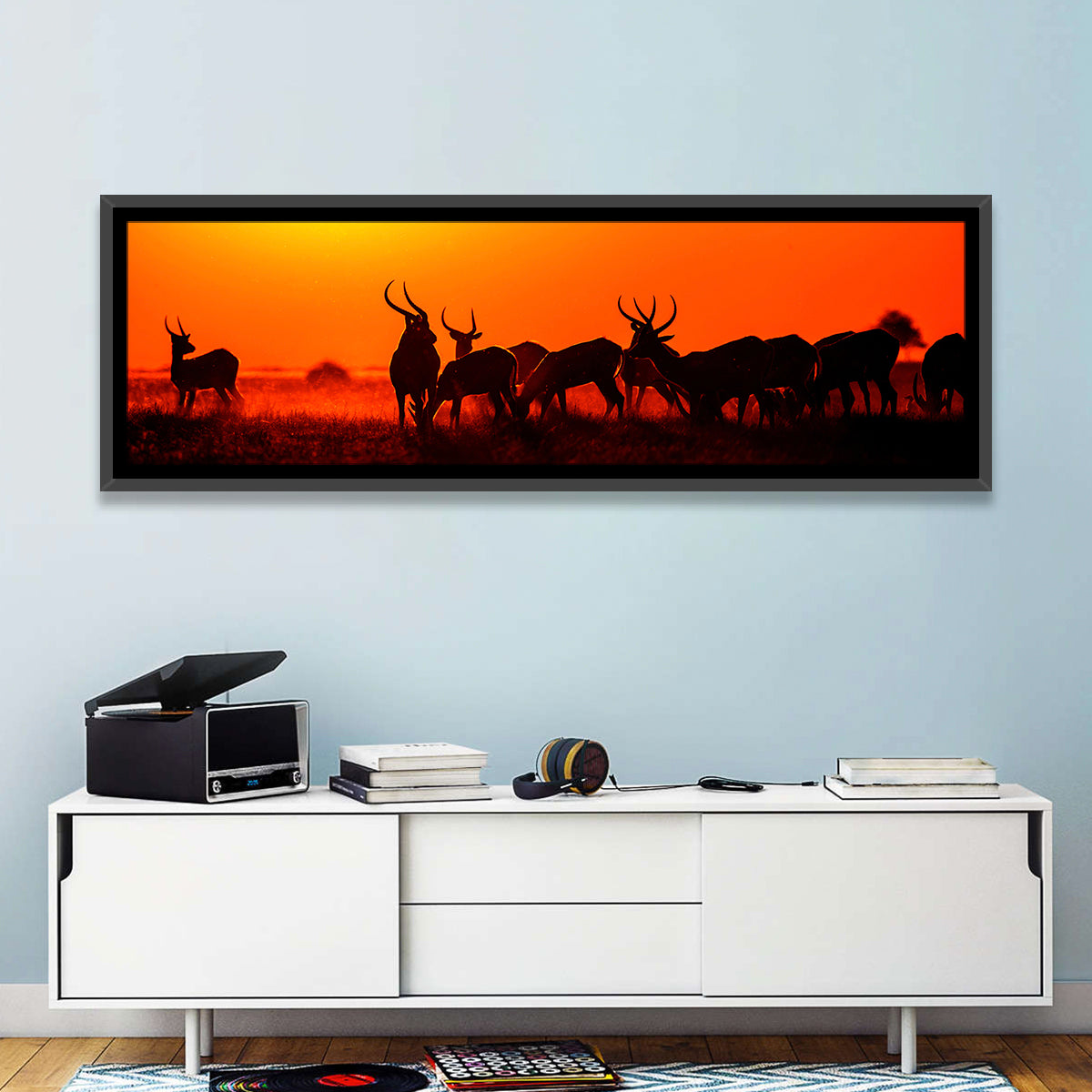 Antelope Herd at Sunset Wall Art in a room, panoramic