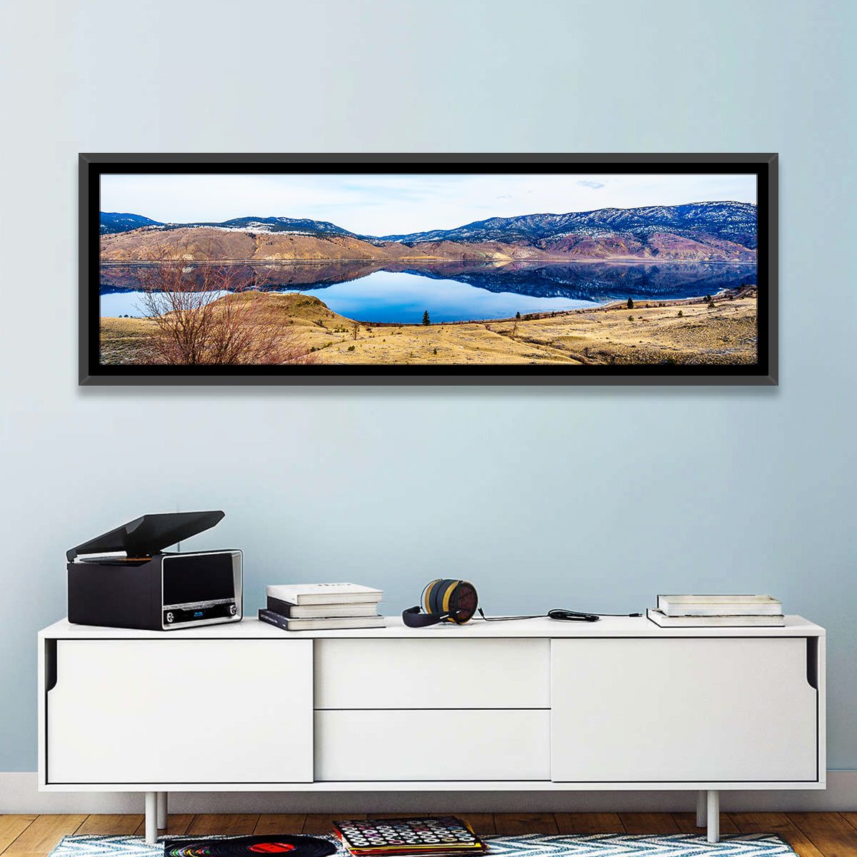 Kamloops Lake Winter Reflection Wall Art in a room, panoramic