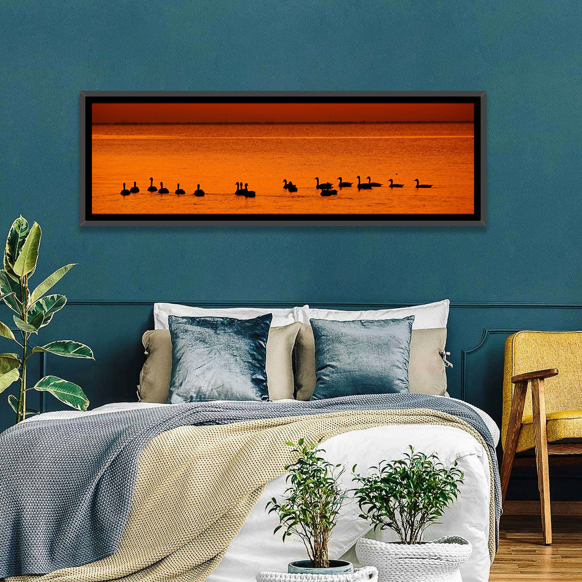 Geese Silhouettes at Orange Sunset Wall Art in a room, panoramic